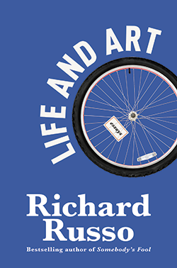 The cover of Life and Art by Richard Russo, featuring a bike wheel with the title in white block letters wrapped around it. The background is dark blue.