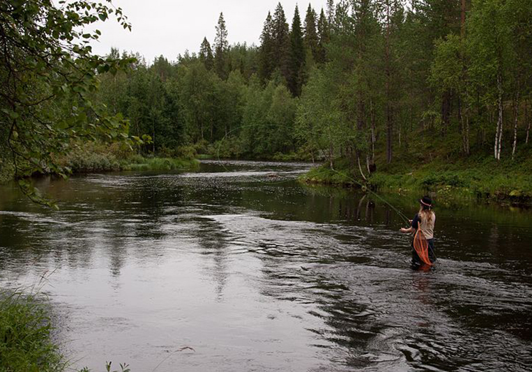 Woman fly-fishing