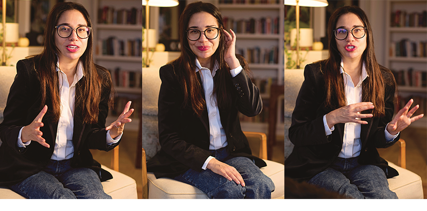 Triptych of photo portraits of a woman with long dark hair and glasses, in a dark blazer, seated in front of bookshelves and gesturing as she speaks