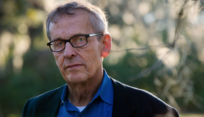 A headshot of Peter Cooley.