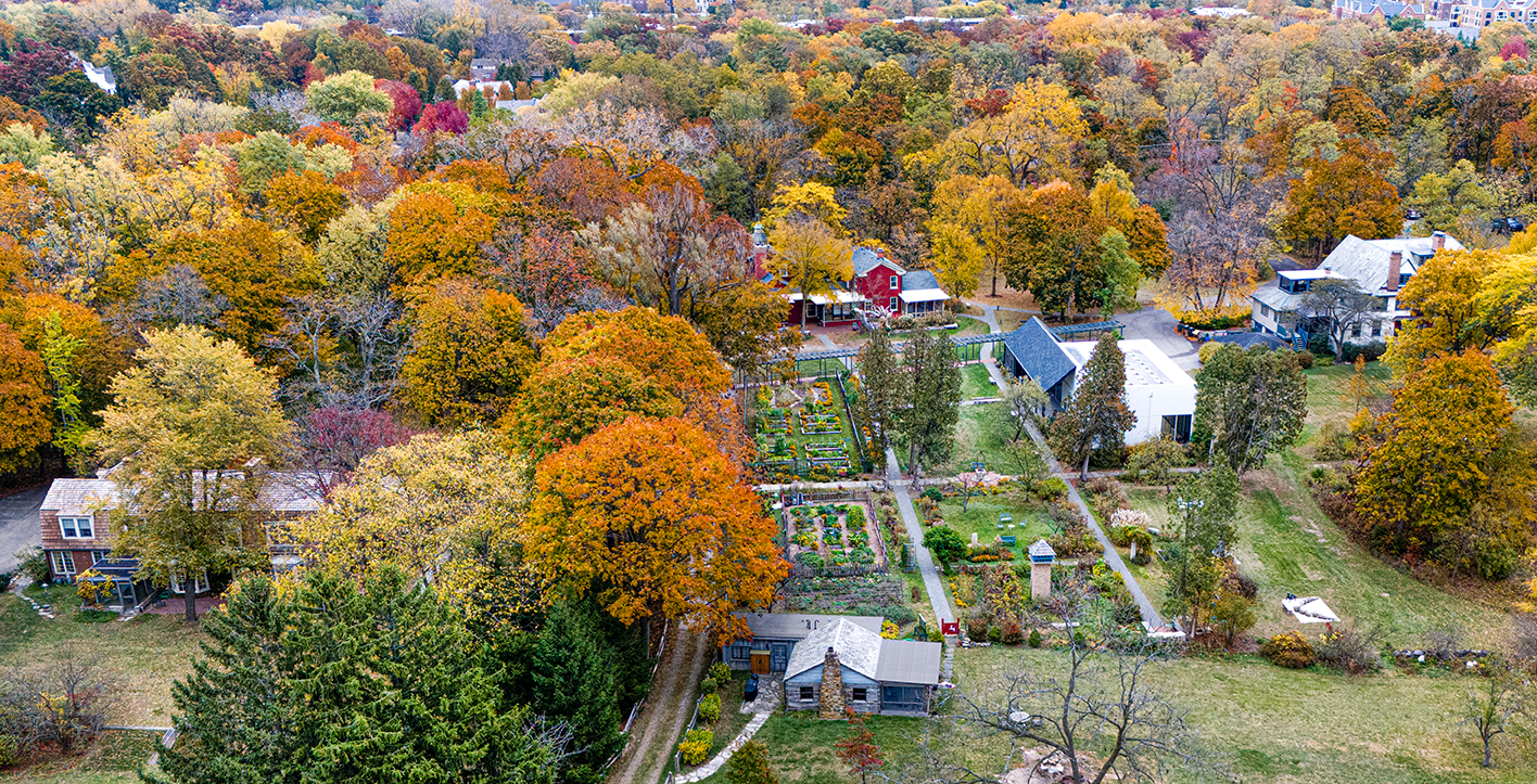 Aerial view of Ragdale in fall, with tree leaves in full color
