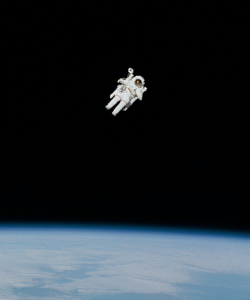 Captured in 1984, the image shows astronaut Bruce McCandless floating far above the earth, making history as the first person to complete a spacewalk without being tethered to a spacecraft.