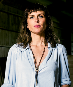 A woman wearing a blue shirt. Courtney Maum