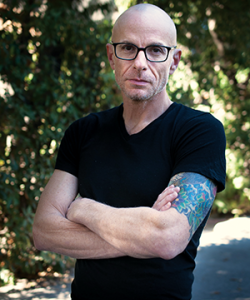 A photograph of a man. David Treuer