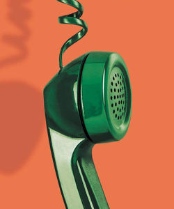 Close-up of the cover of Joshua Ferris’s A Calling for Charlie Barnes. A shiny, emerald-green handset of a corded telephone dangles in the air. The background is a warm orange.