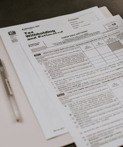 A tax return form sits on a table.
