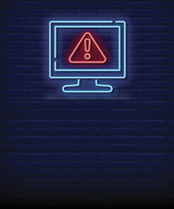 An image of a neon computer with an alert symbol on the screen.