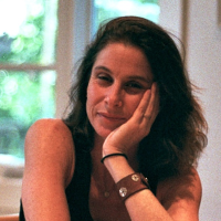 Headshot of Sara Lippmann Headshot of Sara Lippmann, who sits with her head resting in her hand as she sits before a window